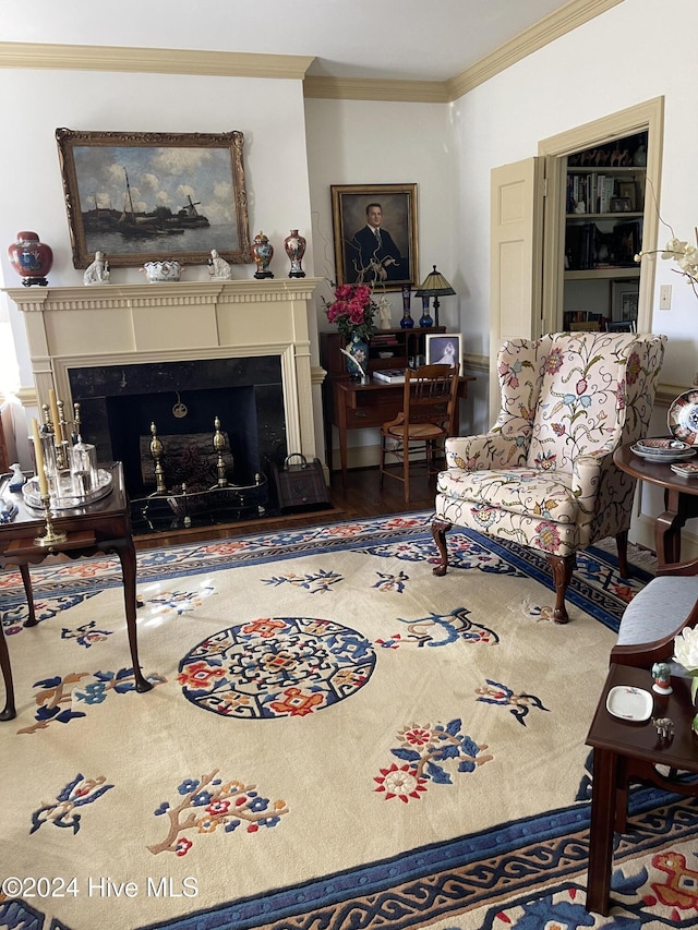 living room featuring hardwood / wood-style flooring and crown molding