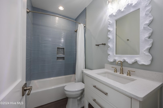 full bathroom with vanity, toilet, and shower / bath combo