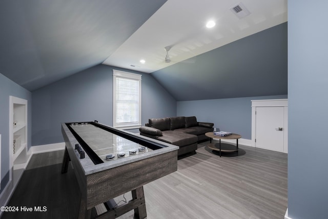 game room featuring ceiling fan, hardwood / wood-style flooring, and lofted ceiling