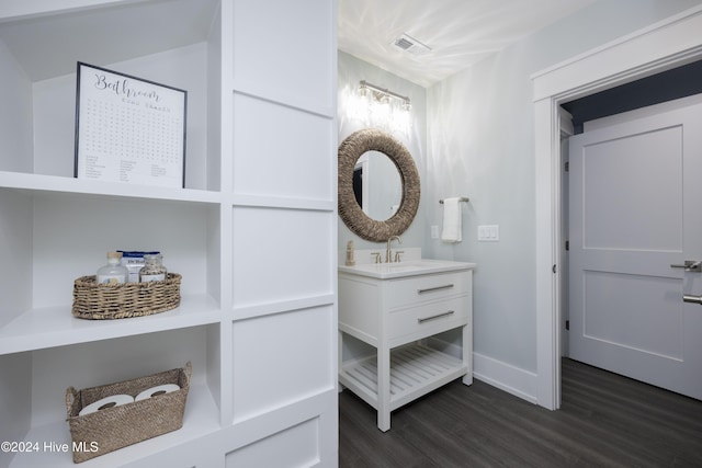 bathroom with wood-type flooring and vanity