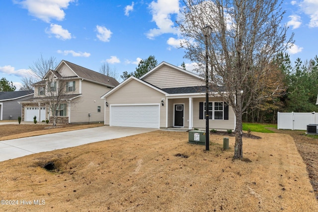 front of property with a garage