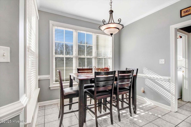 tiled dining area with ornamental molding