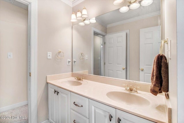 bathroom with vanity and ornamental molding