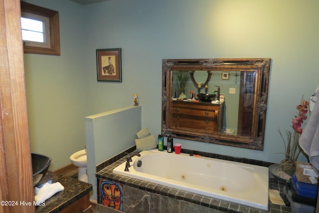 bathroom featuring a relaxing tiled tub and toilet