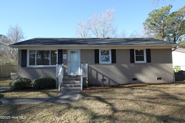 ranch-style home with a front yard