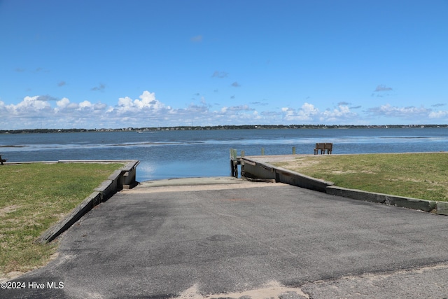 view of water feature with a dock