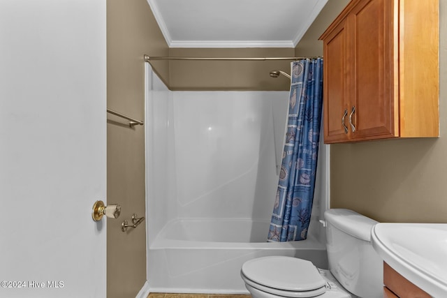 full bathroom with shower / tub combo, toilet, ornamental molding, and sink