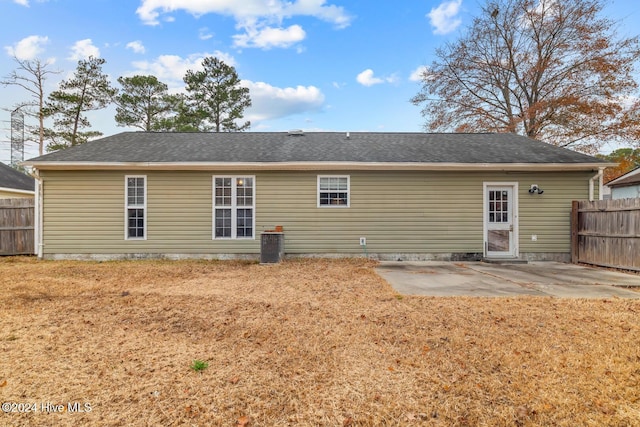 back of property with a patio area