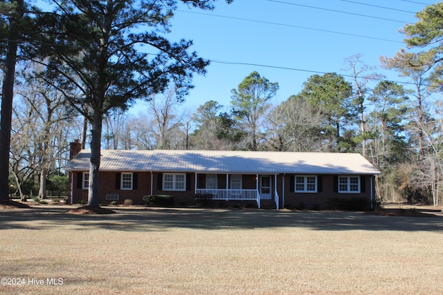 ranch-style house with a porch