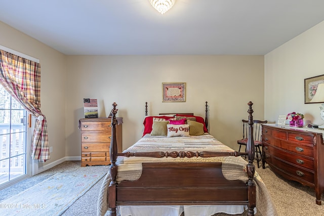 bedroom with light colored carpet