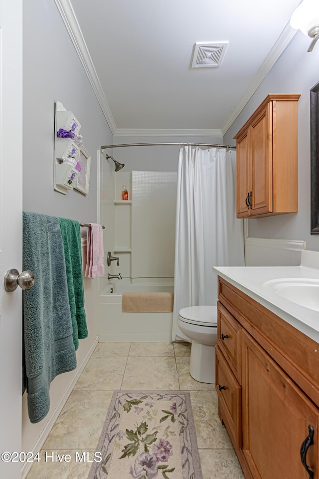 full bathroom featuring vanity, tile patterned floors, toilet, ornamental molding, and shower / bath combo with shower curtain