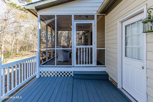 deck featuring a sunroom