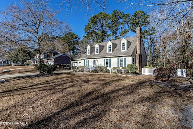 view of new england style home