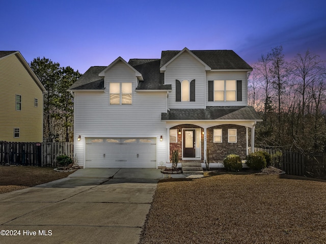 front of property featuring a garage