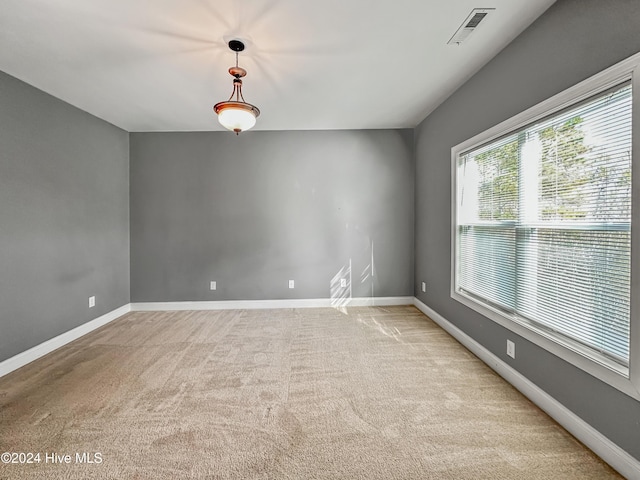 view of carpeted spare room