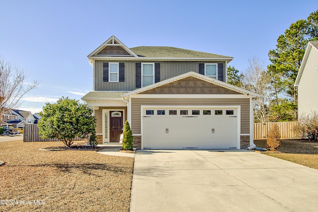 craftsman house with a garage