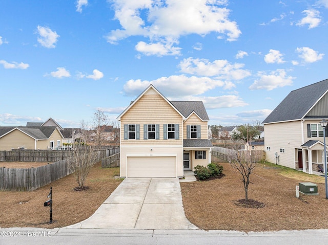 view of property with a garage