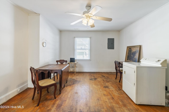 office area with hardwood / wood-style floors, ceiling fan, electric panel, and washer / clothes dryer