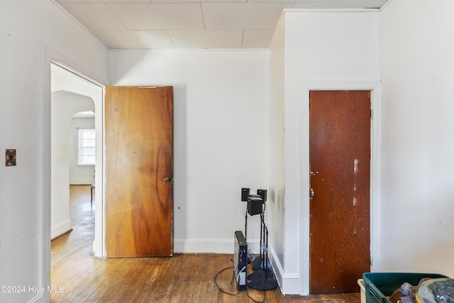 empty room with hardwood / wood-style flooring