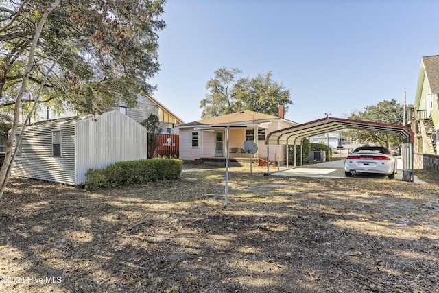 view of front of house with a carport