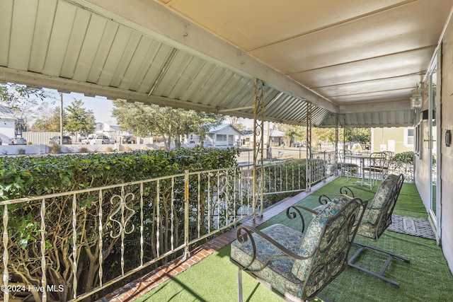 view of patio / terrace with a balcony