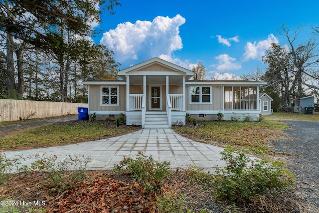 view of front of home featuring covered porch