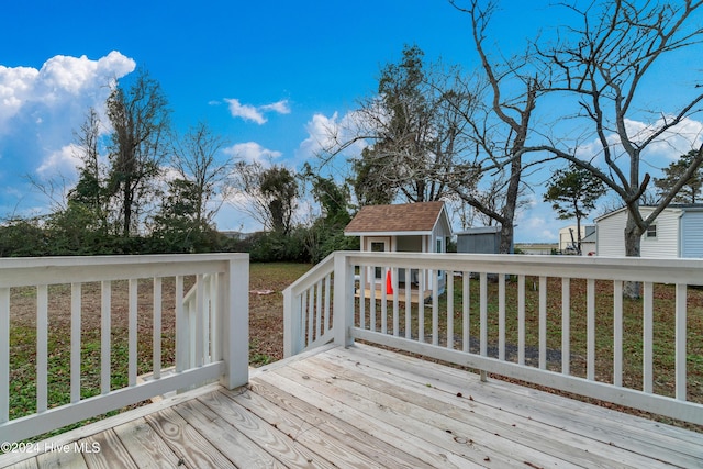 deck featuring a storage shed