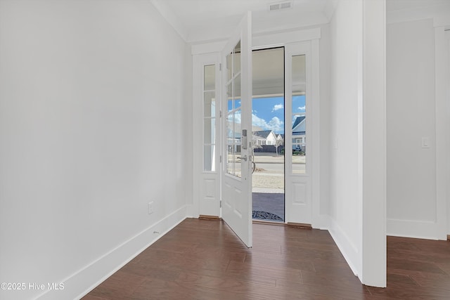 4450 Old Towne St, Wilmington, NC 28412 - unfurnished room featuring dark wood finished floors, baseboards, and ornamental molding