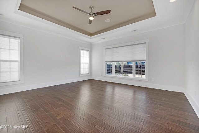 4450 Old Towne St, Wilmington, NC 28412 - empty room with a raised ceiling, a ceiling fan, wood finished floors, ornamental molding, and baseboards