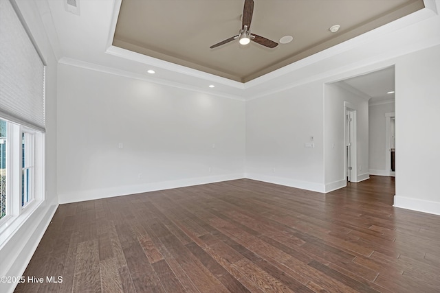 4450 Old Towne St, Wilmington, NC 28412 - empty room with a tray ceiling, ceiling fan, dark wood finished floors, ornamental molding, and recessed lighting
