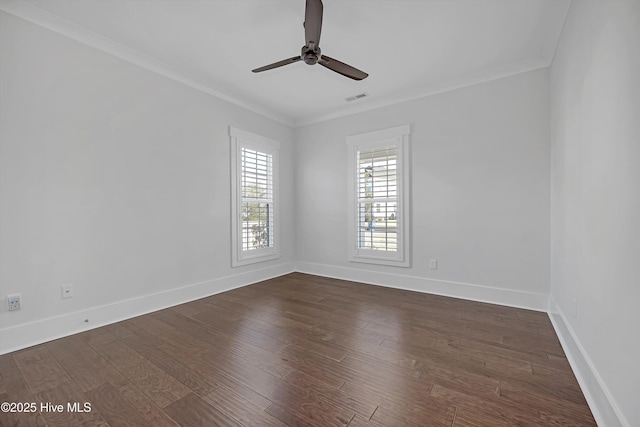 4450 Old Towne St, Wilmington, NC 28412 - spare room with ornamental molding, a ceiling fan, dark wood-type flooring, and baseboards