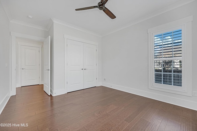 4450 Old Towne St, Wilmington, NC 28412 - unfurnished bedroom featuring wood finished floors, ornamental molding, a closet, baseboards, and a ceiling fan