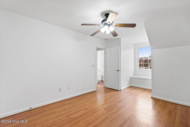 unfurnished bedroom with ceiling fan and light hardwood / wood-style flooring