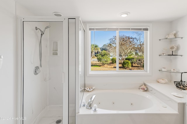 bathroom with independent shower and bath