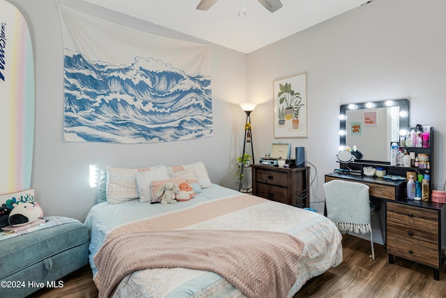 bedroom with ceiling fan and dark wood-type flooring