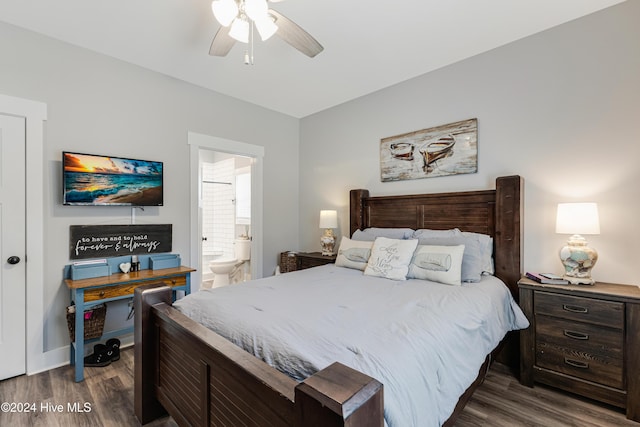 bedroom featuring ensuite bathroom, dark hardwood / wood-style flooring, and ceiling fan