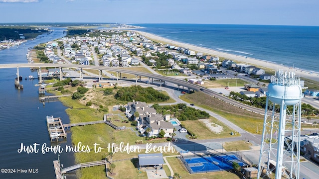 bird's eye view with a beach view and a water view