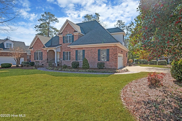 front facade featuring a garage and a front lawn