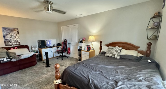 carpeted bedroom with ceiling fan