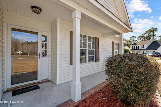 entrance to property with a porch