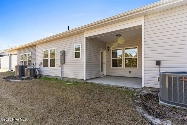 back of house featuring central AC and a patio