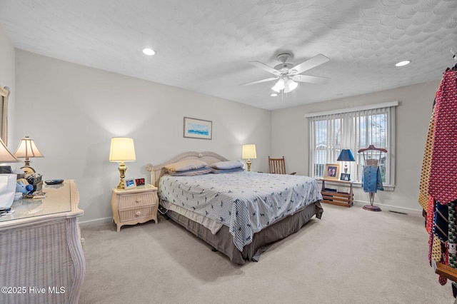 bedroom with a ceiling fan, a textured ceiling, recessed lighting, carpet, and baseboards