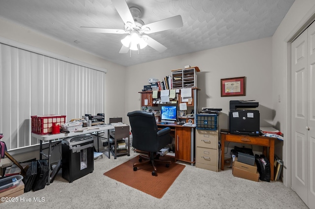 office area featuring a ceiling fan