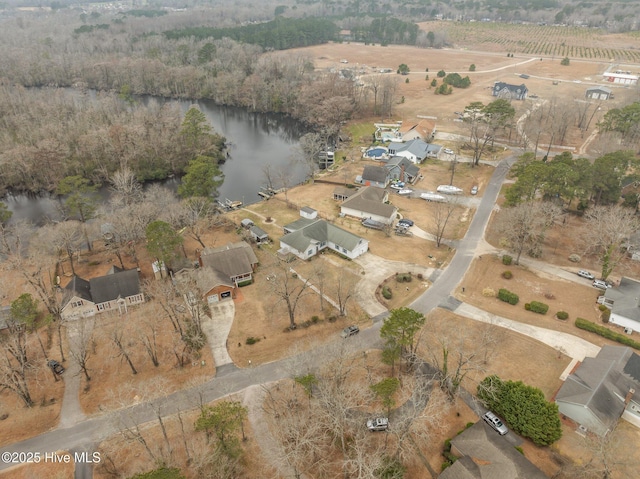 aerial view with a rural view and a water view