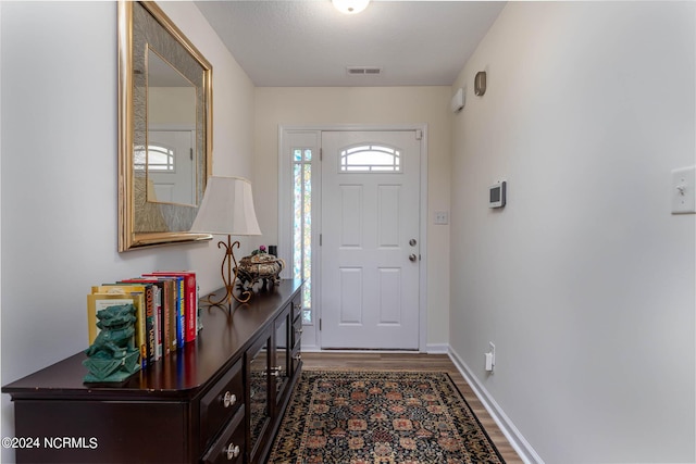 entryway featuring dark hardwood / wood-style floors