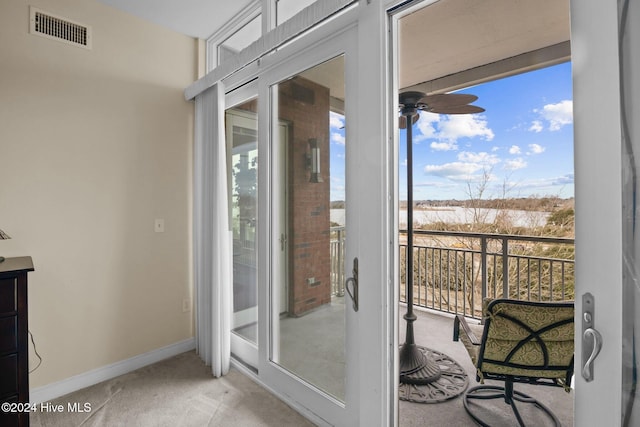 balcony featuring ceiling fan