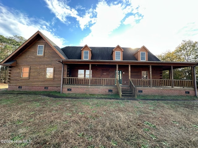 cabin featuring covered porch