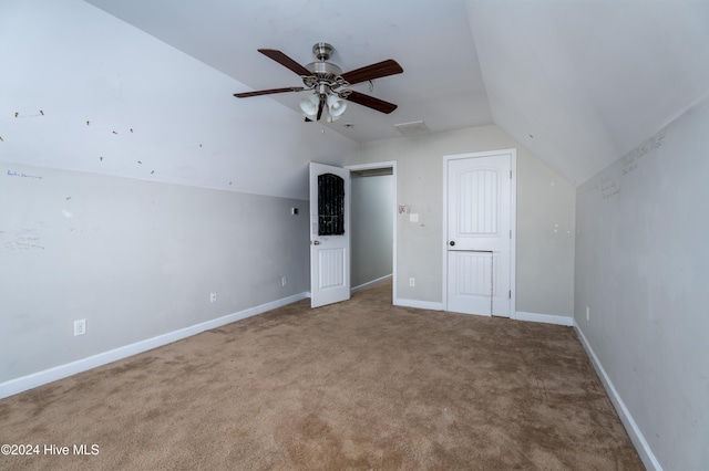 bonus room featuring carpet flooring, vaulted ceiling, and ceiling fan