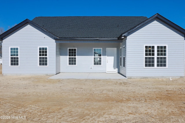 back of property with a patio area