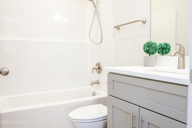 full bathroom with vanity, toilet, and shower / bathtub combination